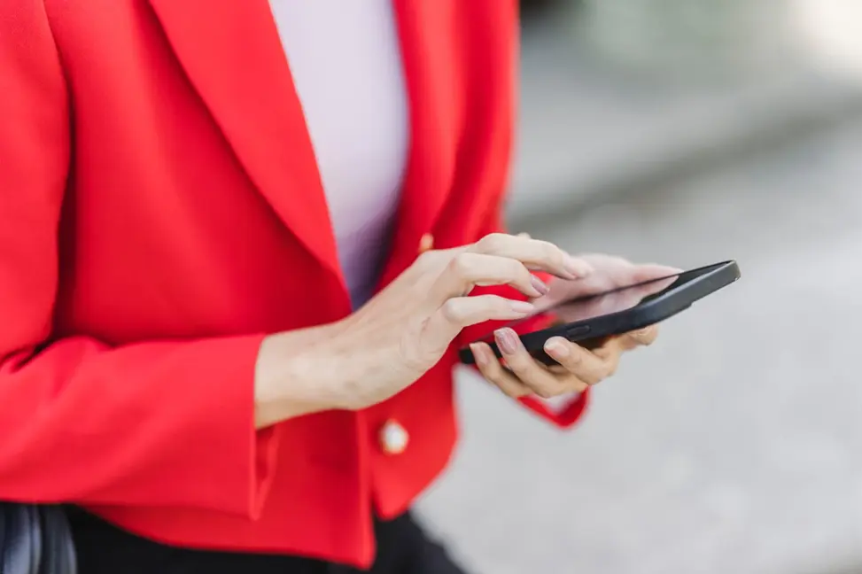 Person looking at their credit report in Canada on their phone.