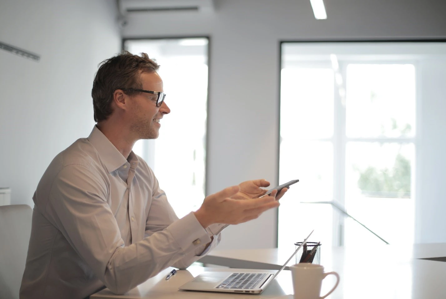 Person looking at computer researching differences between lines of credit and installment loans. 